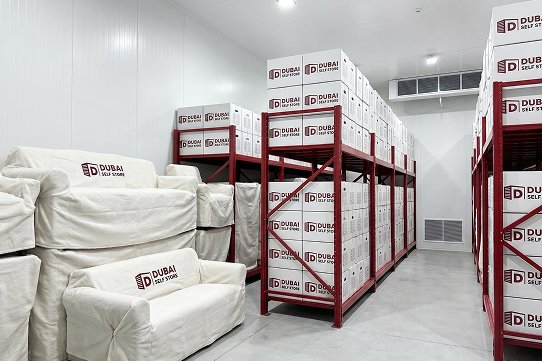 Climate controlled self storage facility in Dubai with neatly stacked, labelled boxes