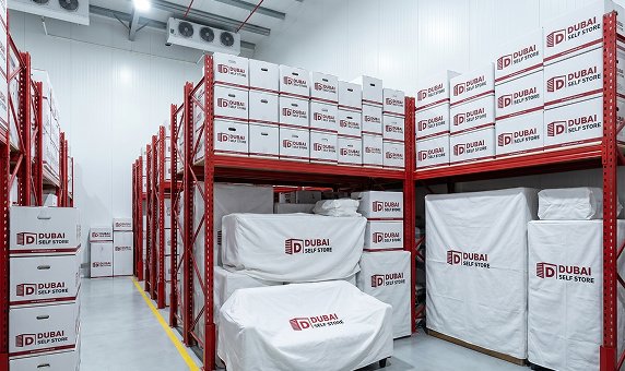 Dubai Self Store team collecting boxes for pick-up and drop-off storage service